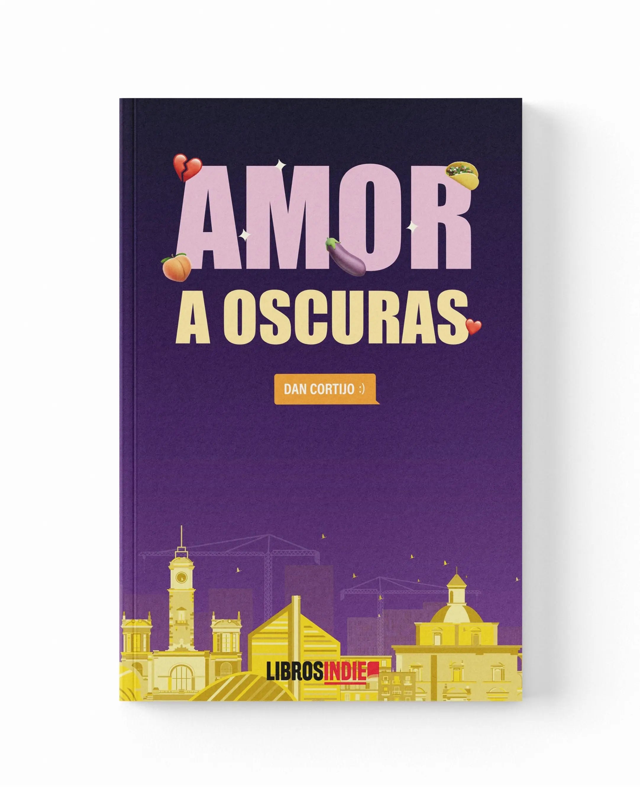 Un libro de tapa blanda morado con el título "AMOR A OSCURAS" y un paisaje urbano.