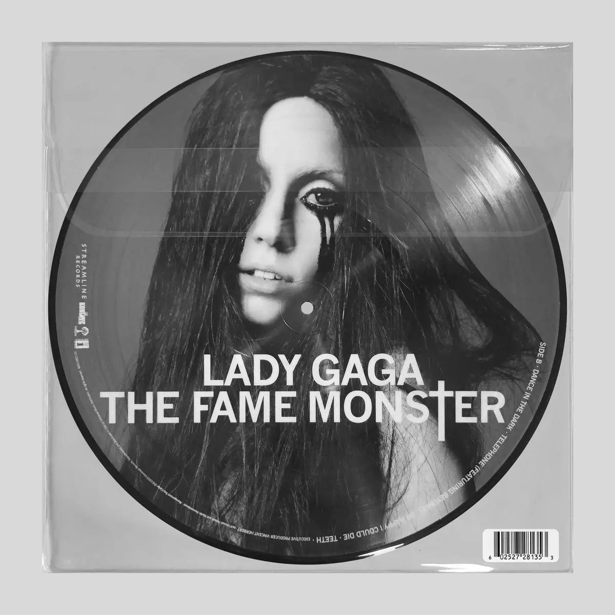 Vinilo picture disc de Lady Gaga, The Fame Monster, con la artista en blanco y negro.