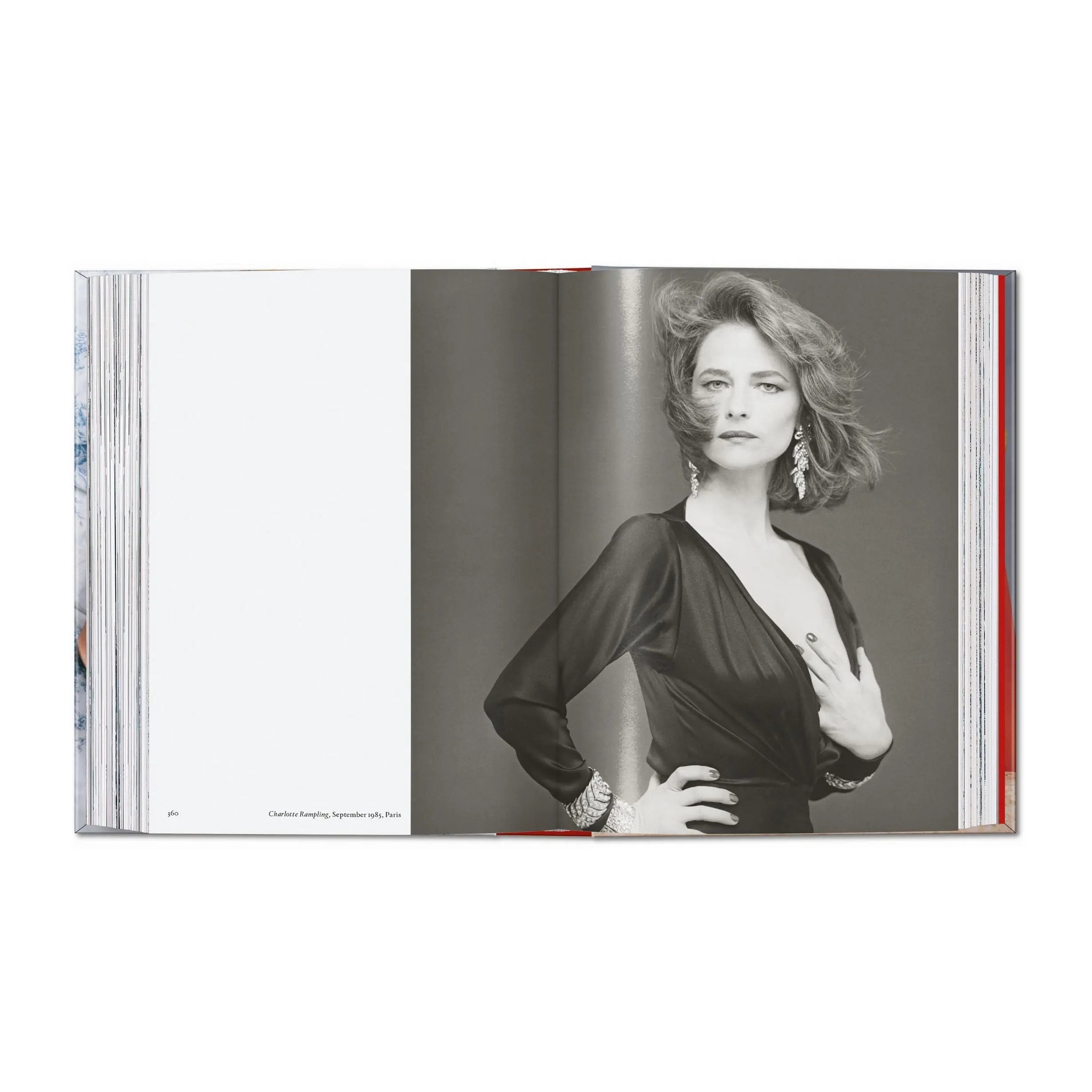 A Bettina Rheims book open to a black and white photo of Charlotte Rampling.