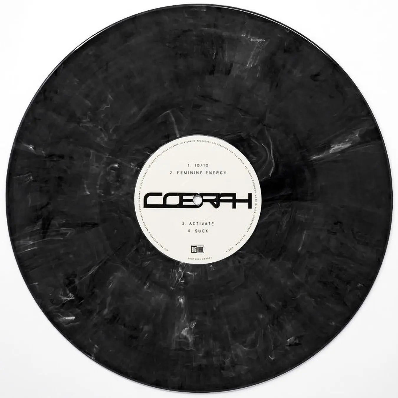 Vinilo negro mármol de COBRAH con cuatro canciones listadas en la etiqueta central.