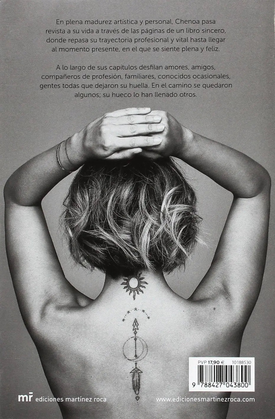 The back cover of a book features a woman with short hair and back tattoos.