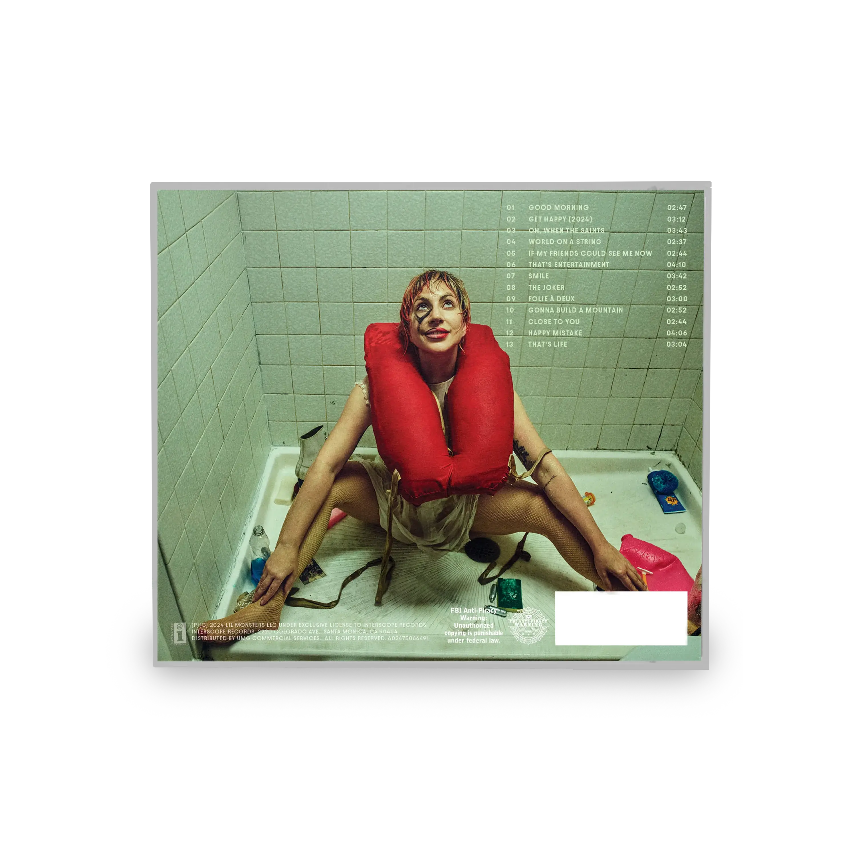 Lady Gaga - Harlequin CD with tracklist and a woman in a life vest.