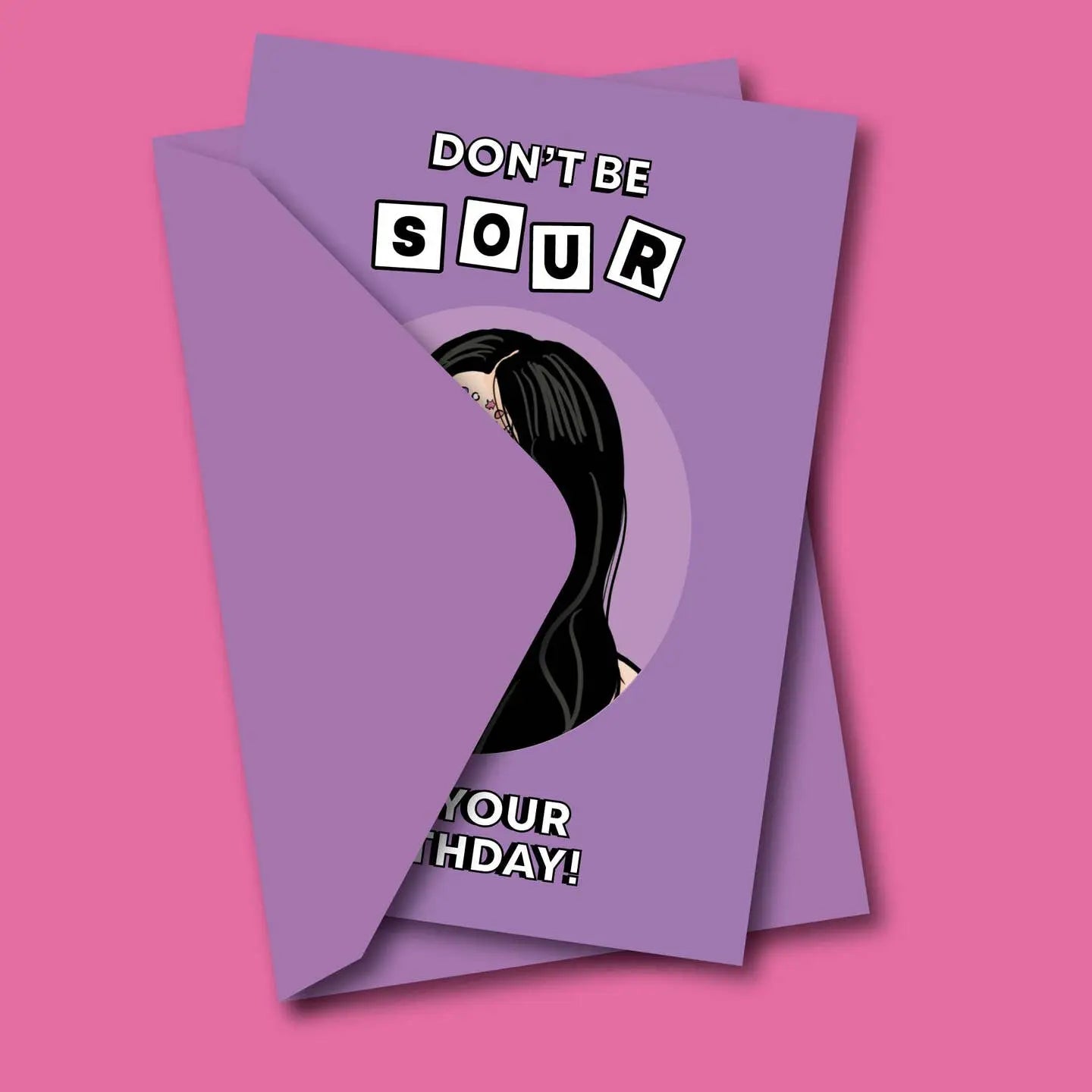 Tarjeta de felicitación morada con la frase "Don't be sour" y una ilustración de una mujer.