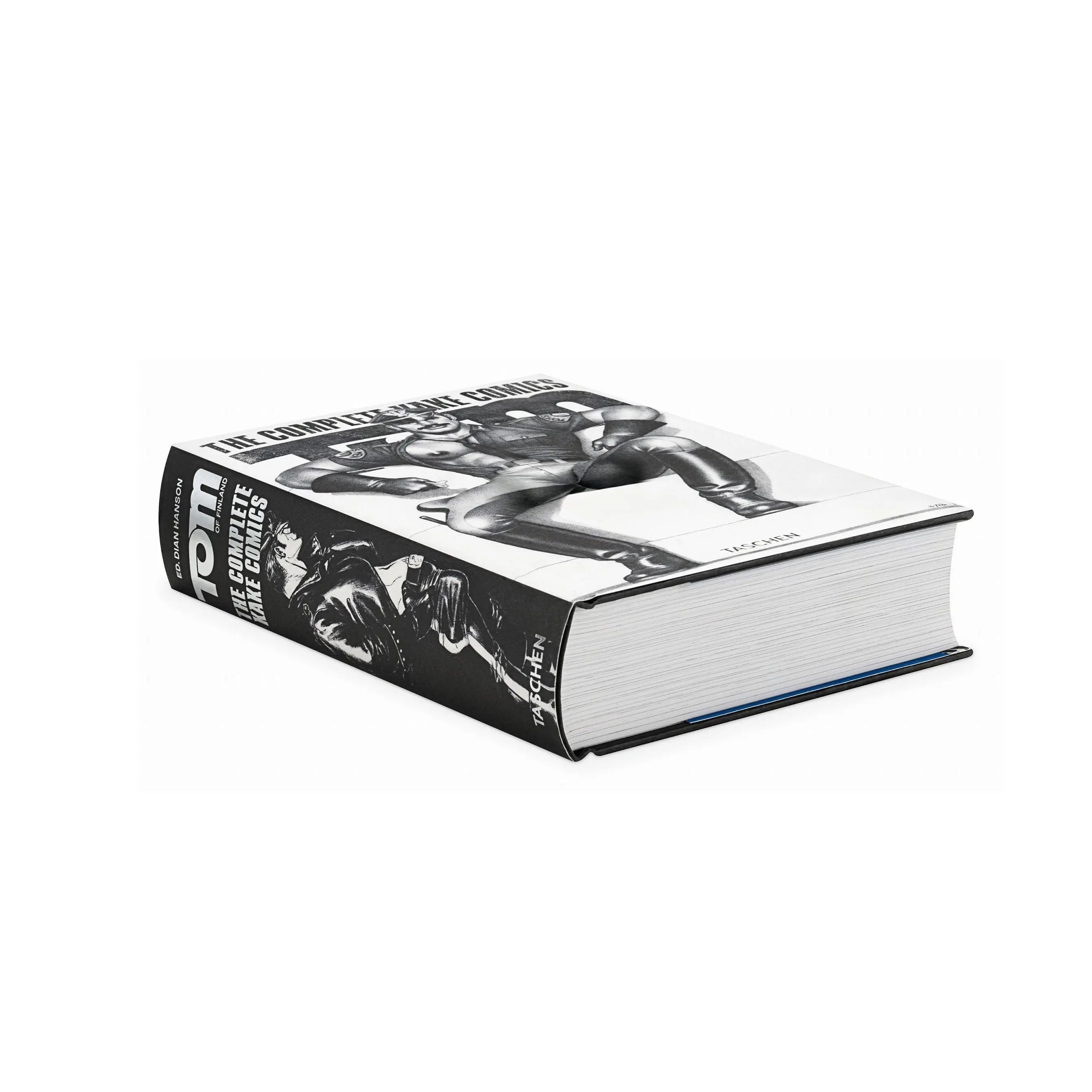 TOM OF FINLAND. The Complete Kake Comics, a thick book with a black and white cover.